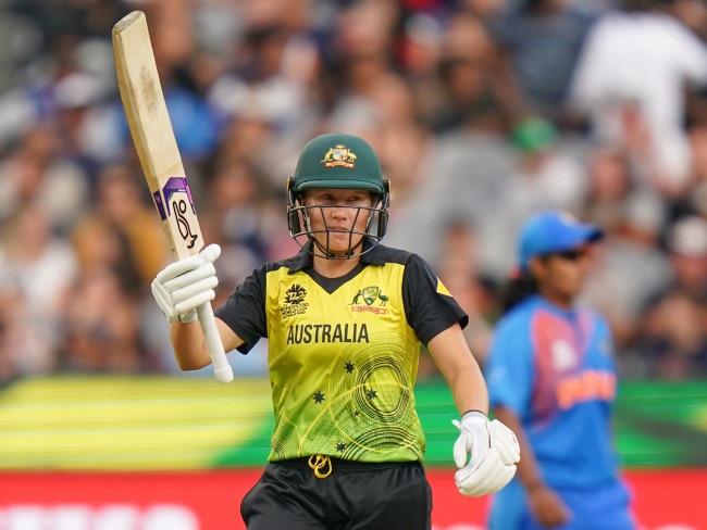 Alyssa Healy reacts to passing 50 with a muted celebration.