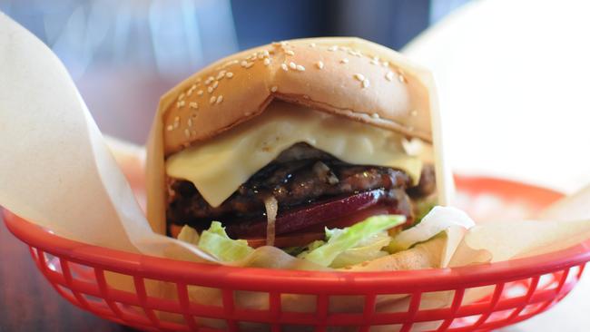 The Pirate is Pirate's Grill in Dural's take on a classic Australian-style hamburger with the lot: Angus beef patty, bacon, egg, grilled tomato, cheese, lettuce, tomato, beetroot, grilled onion and barbecue sauce ($10). Picture: Stacey Roberts