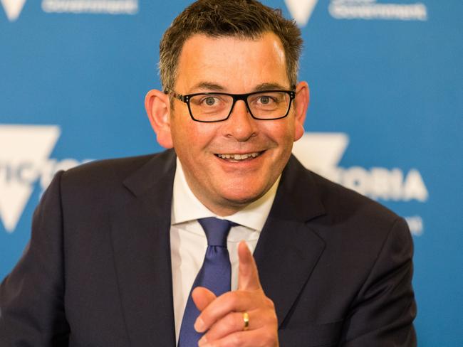 MELBOURNE, AUSTRALIA - NOVEMBER 18: Premier of Victoria Daniel Andrews makes a gesture while speaking during a press conference on November 18, 2021 in Melbourne, Australia. Premier Daniel Andrews has announced COVID-19 restrictions will relax further from 11:59 pm tonight as Victoria reaches 90 per cent double vaccination target. The eased restrictions mean there will no longer be caps on gatherings, meaning no more restrictions on visitors in people's homes and no density limits at hospitality venues. (Photo by Asanka Ratnayake/Getty Images)