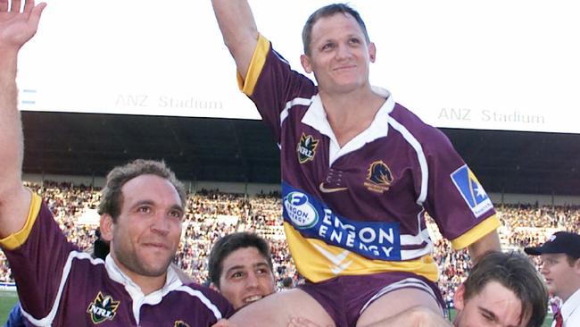 2000: Broncos Players Gorden Tallis with Luke Priddis and Shaun Berrigan carrying Kevin Walters off ground on his final home match.