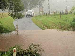 SES on scene art Lindendale after a call for help at a flooded crossing. Picture: Marc Stapelberg