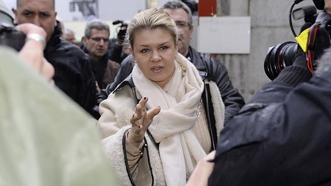 Corinna Schumacher, the wife of German Formula One world champion Michael Schumacher, arrives surrounded by photographers at ...