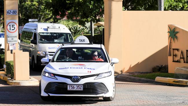 Taxis leave the Earle Haven Nursing Home following its closure on the Gold Coast (AAP Image/Tim Marsden)