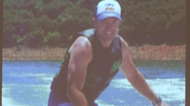 A picture of Jarrod Fox wakeboarding, shown at his funeral on August 28 in Lilydale. Picture: Screenshot of livestream by Belinda Jane video.