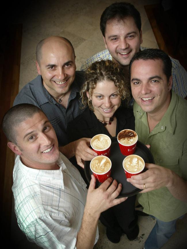 CIBO Espresso cafe chain then directors Claudio Ferraro, Salvatore Pepe, Angelo Inglese and Roberto Cardone with staff member Sally Clark in 2006.