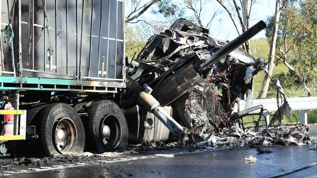 One truck burst into flames after running into the back of another on the freeway. Picture: Tait Schmaal