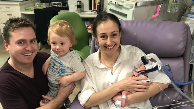 Brave face: Samantha Bladwell holds baby Cecilia who was delivered prematurely to allow Samantha’s lung cancer treatment to begin. With husband, Cam, and son, Max.