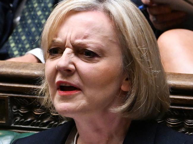 A handout photograph released by the UK Parliament shows Britain's Prime Minister Liz Truss reacting during Prime Minister's Questions in the House of Commons in London on October 19, 2022. - Truss is addressing lawmakers in parliament for the first time since abandoning her disastrous tax-slashing economic policies, as she fights for her political life. (Photo by JESSICA TAYLOR / UK PARLIAMENT / AFP) / RESTRICTED TO EDITORIAL USE - NO USE FOR ENTERTAINMENT, SATIRICAL, ADVERTISING PURPOSES - MANDATORY CREDIT 