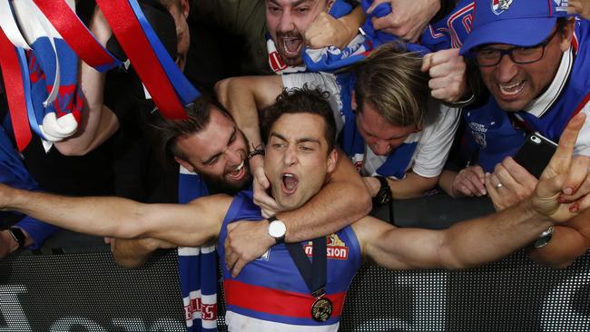 Luke Dahlhaus celebrates with fans after winning the Grand Final. Picture: David Caird