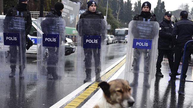 Turkish police officers block the road close to the site of an armed attack near the Reina nightclub. Picture: AFP/YASIN AKGUL