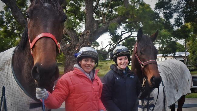 Trackwork rider Tayla Poy and jockey Leah Kilner with Volfoni and Swanton who both won on Westlawn Day.