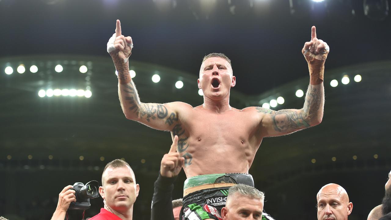 Danny Green celebrates victory against Anthony Mundine. (AAP Image/David Mariuz)