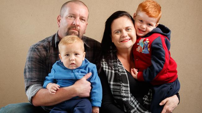 Cathy Jayne Hogben (formerly Pearce) with husband Daniel and children Jacob, 1, and Levi, 4, at their modest suburban home. Picture: Matt Turner.