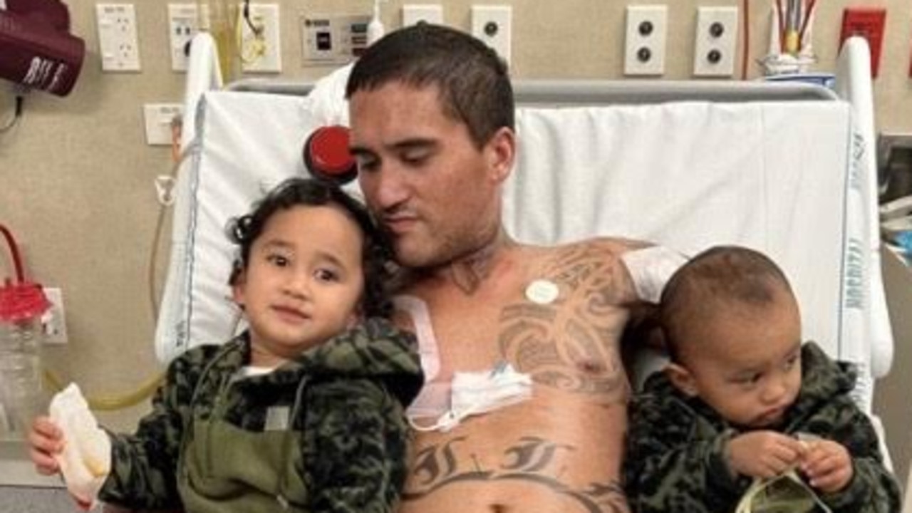 Jahden Nelson in hospital with his children Valley Rose and Kaiser.