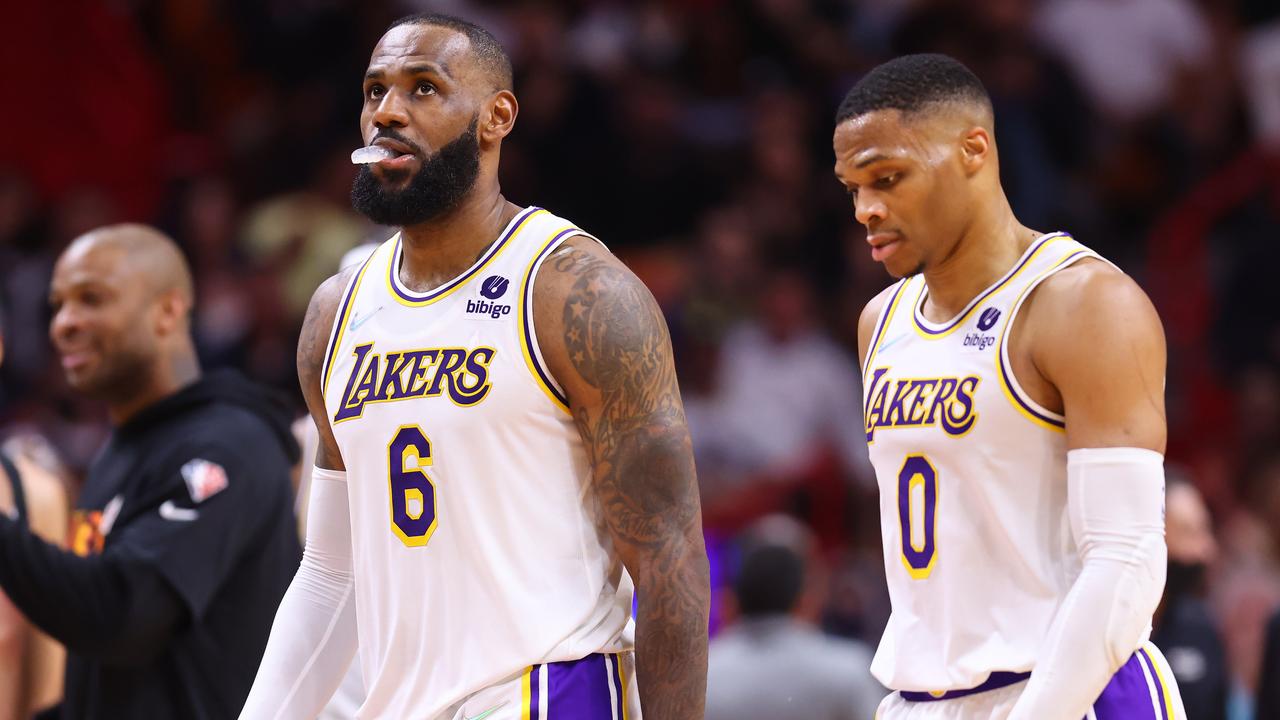 MIAMI, FLORIDA - JANUARY 23: LeBron James #6 and Russell Westbrook #0 of the Los Angeles Lakers react against the Miami Heat during the first half at FTX Arena on January 23, 2022 in Miami, Florida. NOTE TO USER: User expressly acknowledges and agrees that, by downloading and or using this photograph, User is consenting to the terms and conditions of the Getty Images License Agreement. (Photo by Michael Reaves/Getty Images)