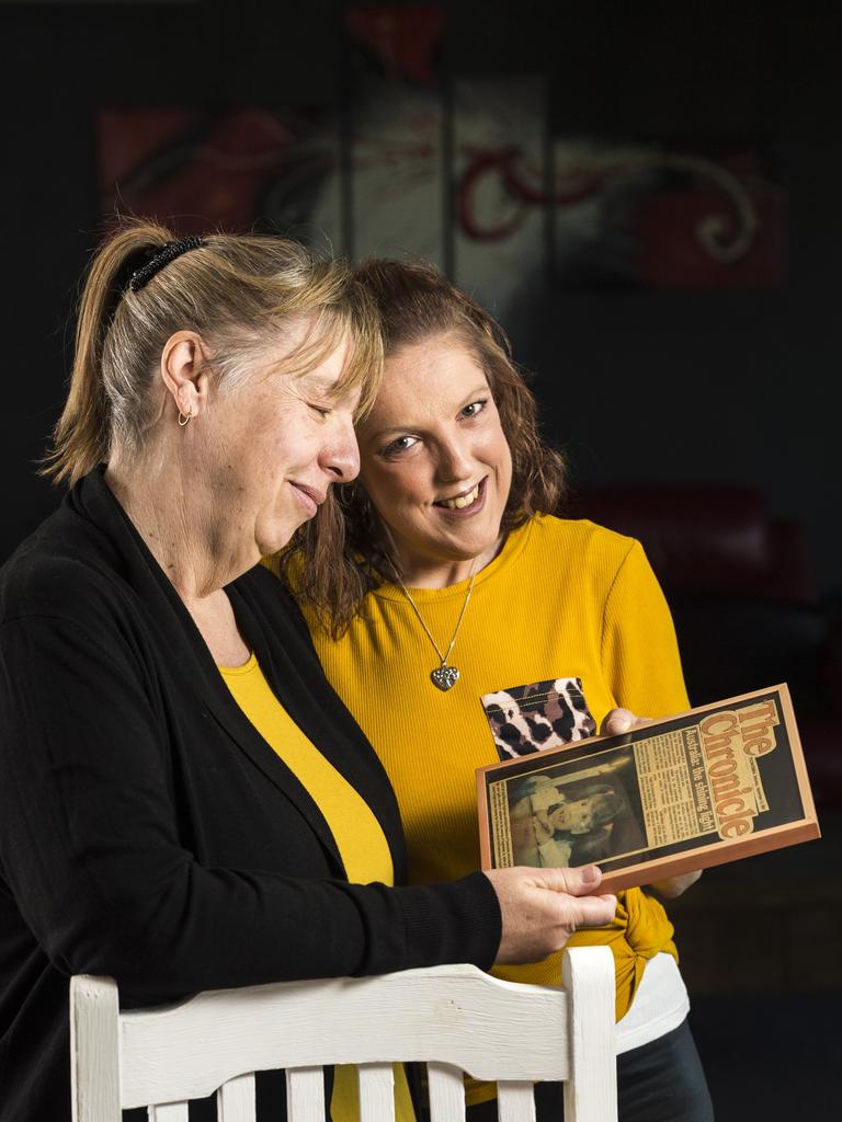 Kahler Baker with mum Leanne Rissman look over an article from The Chronicle featuring a five-year-old Kahler. Kahler has Alagille syndrome and requires a kidney donation after receiving a liver donation at the age of five, Friday, July 30, 2021. Picture: Kevin Farmer