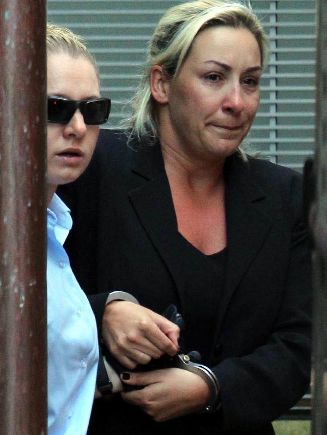 Keli Lane in handcuffs in 2010.