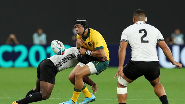 Christian Lealiifano spills the ball during Australia’s come-from-behind win over Fiji. Picture: Getty