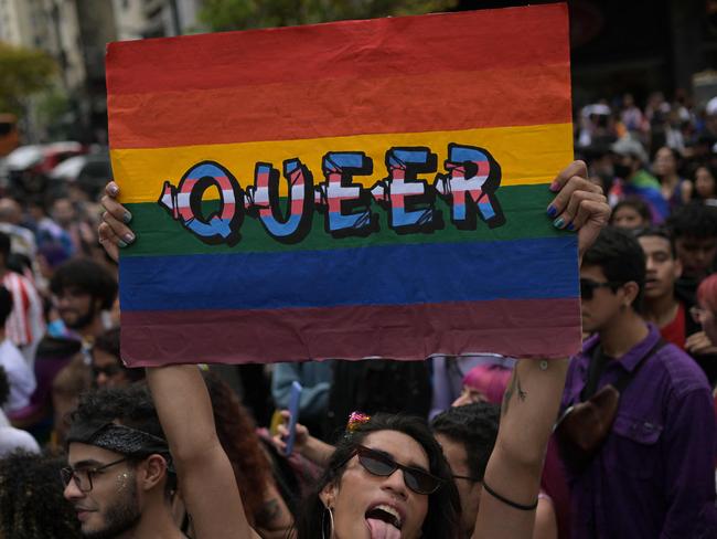 A member of the Lesbian, Gay, Bisexual and Transgender (LGBT+) community takes part the annual Pride Parade in Caracas on July 3, 2022. (Photo by Federico PARRA / AFP)