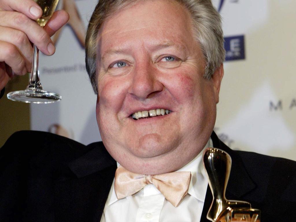 John Wood holding his Gold Logie award statue in 2006.