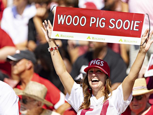 A Razorback fan cheers on her team. Picture: Wesley Hitt/Getty Images