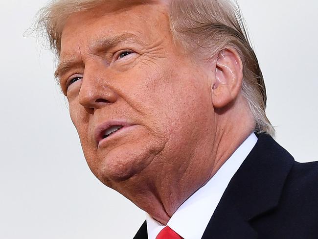 TOPSHOT - US President Donald Trump speaks during a rally at Muskegon County Airport in Muskegon, Michigan on October 17, 2020. (Photo by MANDEL NGAN / AFP)