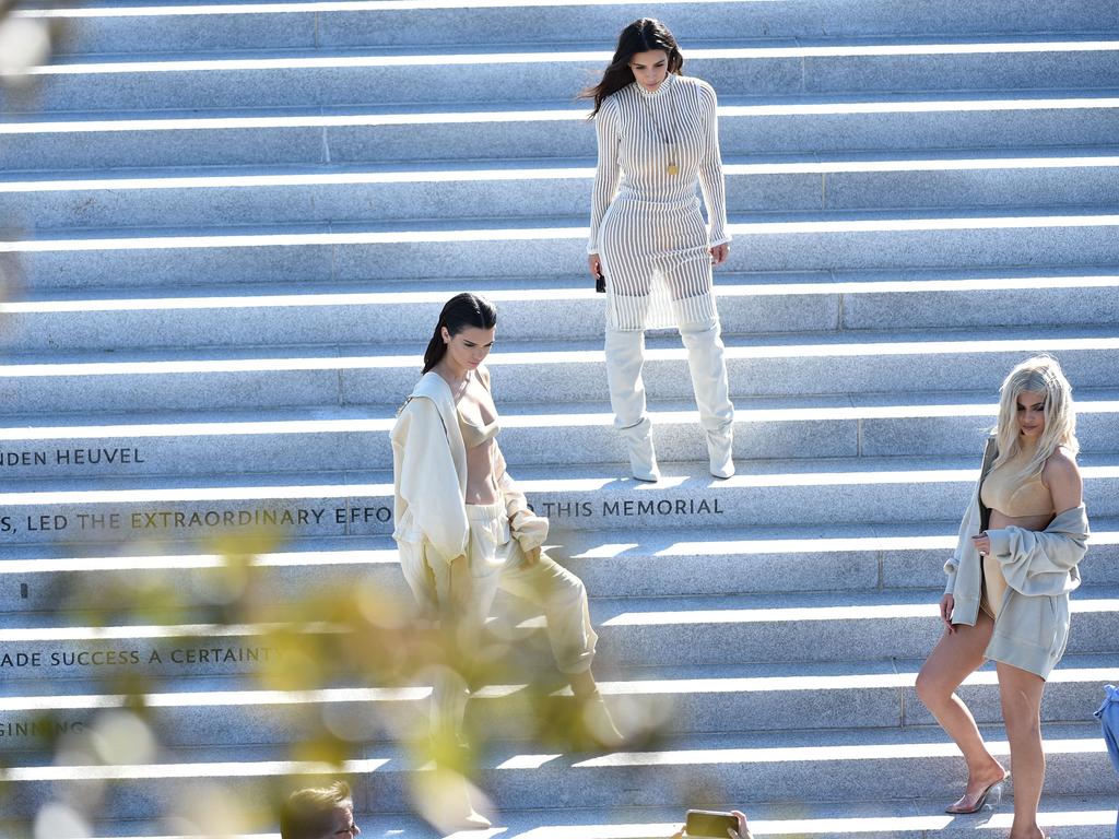 Kendall Jenner, Kim Kardashian and Kylie Jenner attend the Kanye West Yeezy Season 4 fashion show on September 7, 2016 in New York City. Picture: Getty