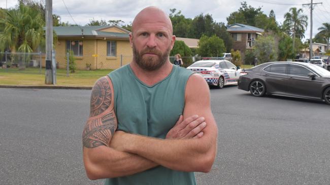 Daniel White led the crowd on Sunday across homes in north Rockhampton believed to be where the alleged offenders lived.