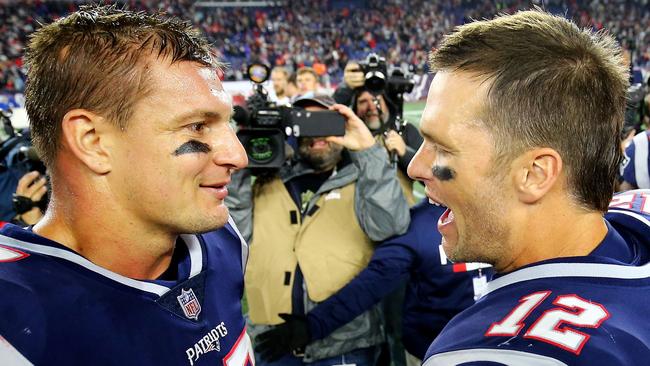 Tom Brady, right, and Rob Gronkowski celebrate a New England Patriots win over Kansas City Chiefs in 2018. Picture: AFP