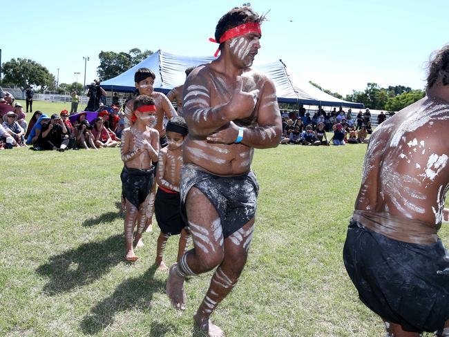 The Òwirdi binbiÓ dance group preform during the welcome to country at the Clermont end of the Anti Adani Convoy, Clermont show grounds, on Sunday, April 28, 2019. Picture: AAP/Steve Pohlner