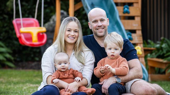 Rachael Dutschke with husband Josh and kids Banjo (4 months) and Bodhi (21 months) at her Lower Mitcham home. Picture: Tom Huntley