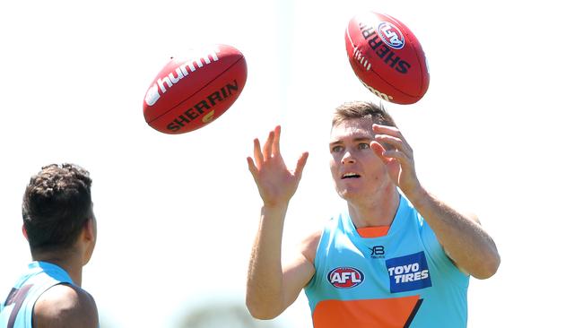 Adam Tomlinson juggles at GWS training this week. Picture: Phil Hillyard.