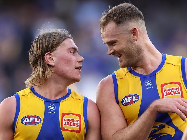 PERTH, AUSTRALIA - JUNE 01: Harley Reid and Matt Flynn of the Eagles share a moment while walking from the field at the half time break during the round 12 AFL match between West Coast Eagles and St Kilda Saints at Optus Stadium, on June 01, 2024, in Perth, Australia. (Photo by Paul Kane/Getty Images)