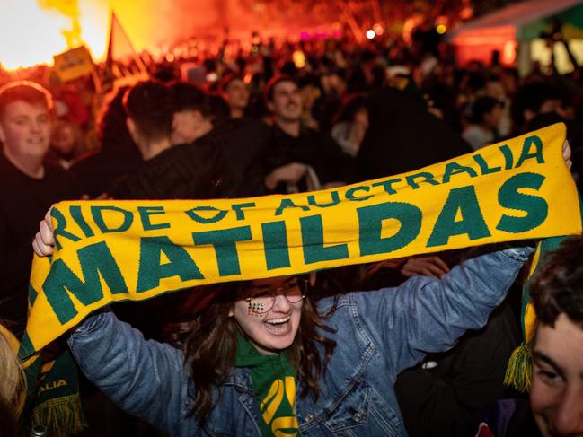 Fans at Federation Square react as they watch the Matildas FIFA World Cup Semi Final Game. Picture: Darrian Traynor