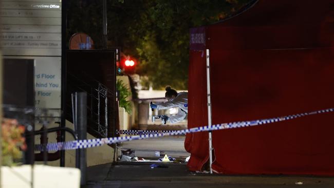 Forensic police at the scene outside Blacktown Police Station where two teenage boys presented with stab wounds after being stabbed outside Doonside Technology High School. Picture: Richard Dobson