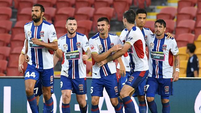 Newcastle Jets celebrate a goal. (AAP Image/Dan Peled)