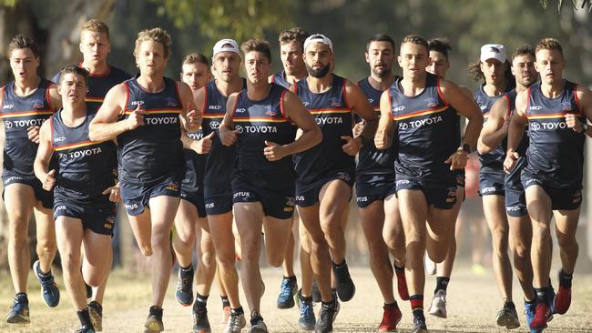 Crows players during a time trial around Uni Loop in North Adelaide last November. Picture: Dean Martin (AAP)