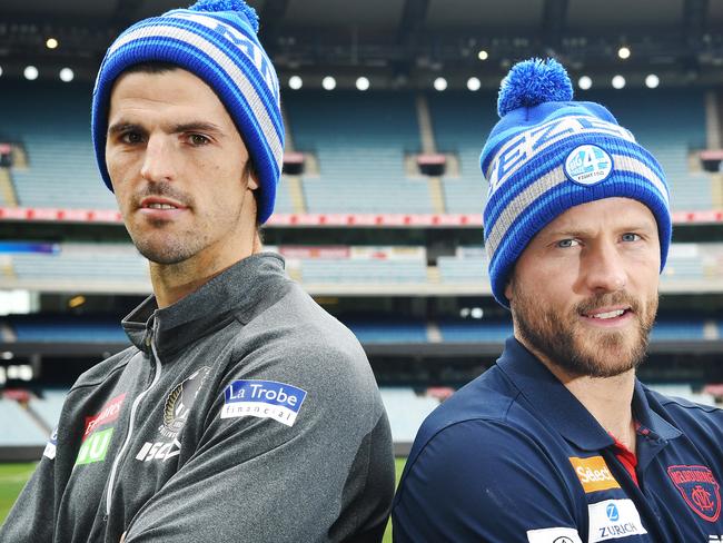 Collingwood captain Scott Pendlebury (left) and co-captain Nathan Jones pose for a photograph along the boundary line at the Melbourne Cricket Ground in Melbourne, Thursday, June 7, 2018. Pendlebury and Jones front the media ahead of the Queen's Birthday clash in support of FightMND. (AAP Image/James Ross) NO ARCHIVING