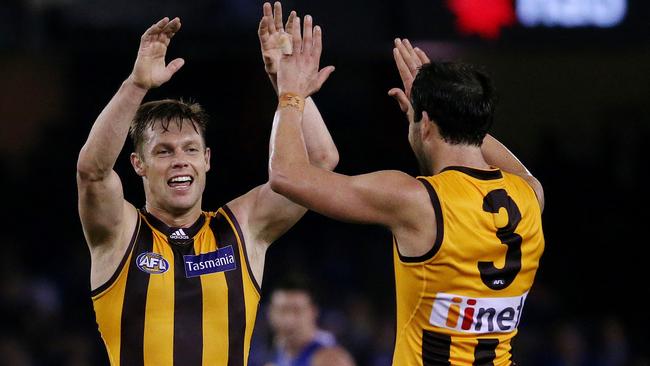 Hawks fans are aggrieved that these two blokes will never again be seen playing for Hawthorn. Picture: Colleen Petch