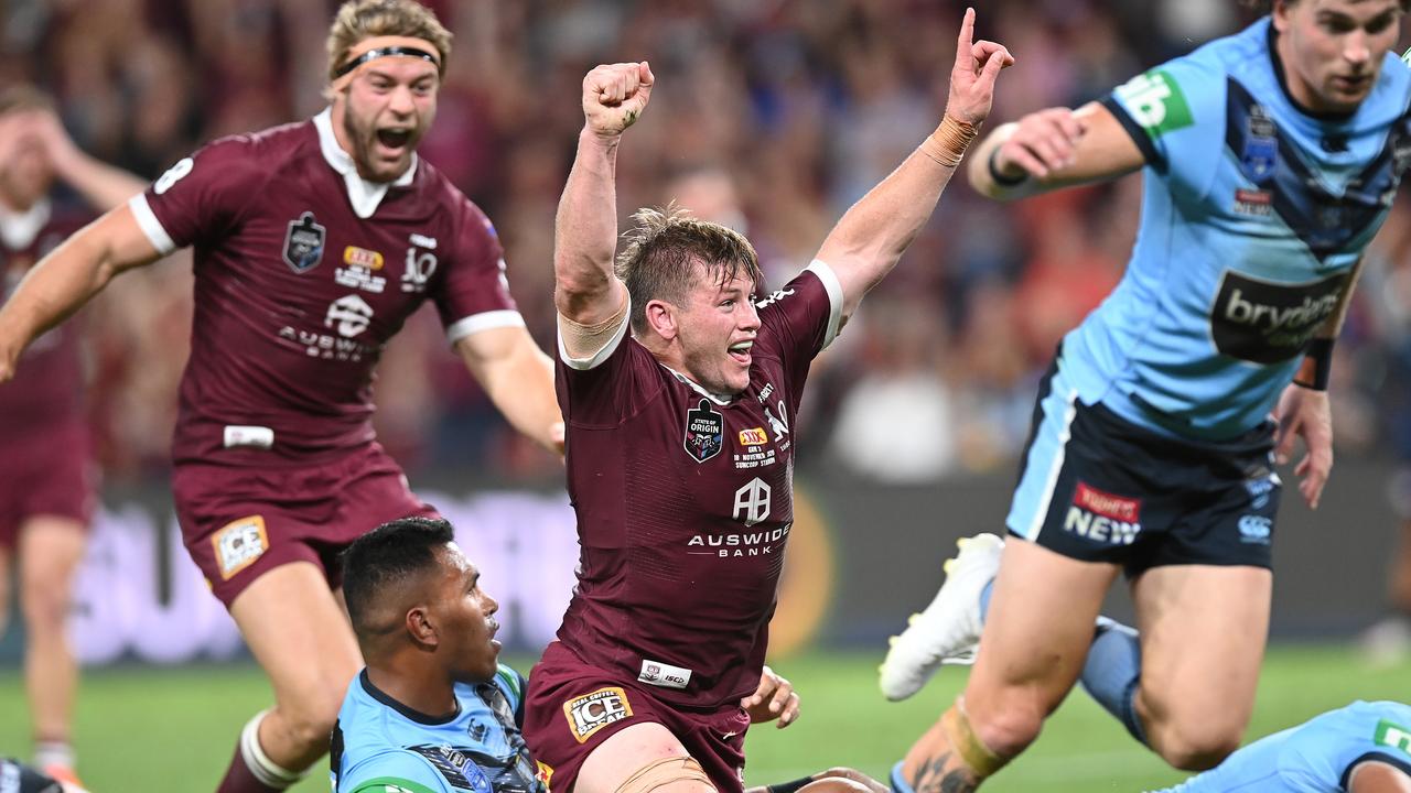 Harry Grant of the Maroons celebrates after scoring a try on his Origin debut