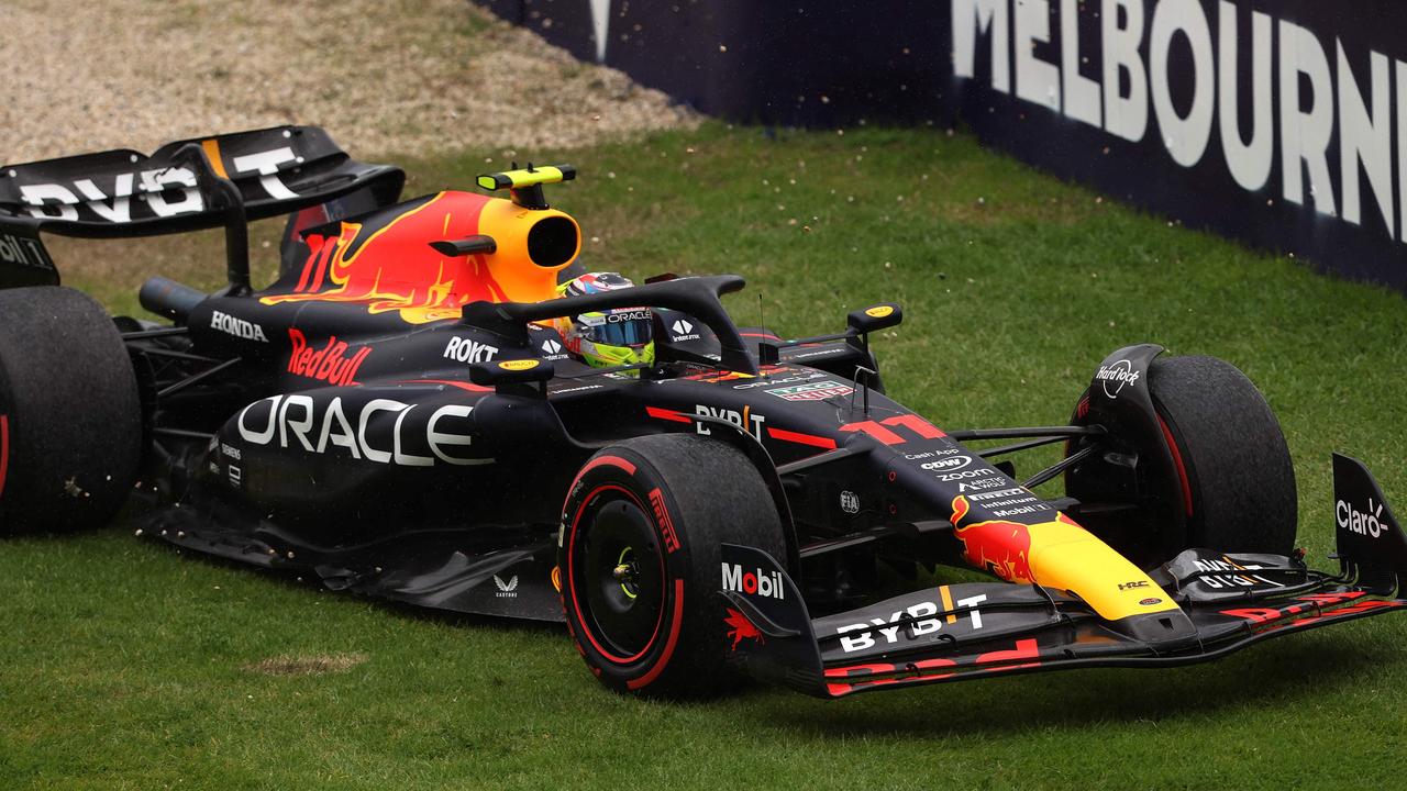 Red Bull Racing's Mexican driver Sergio Perez recovers after going off the track after rain started falling during the practice session.