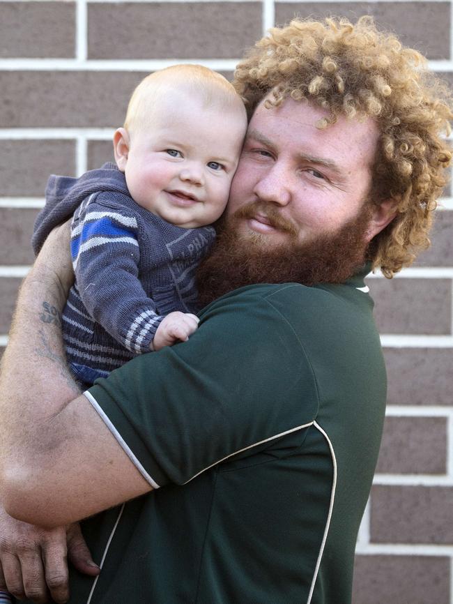 Toowoomba Dad Jeremi Simpson with his son Kaiden. Picture: AAP/Image Sarah Marshall