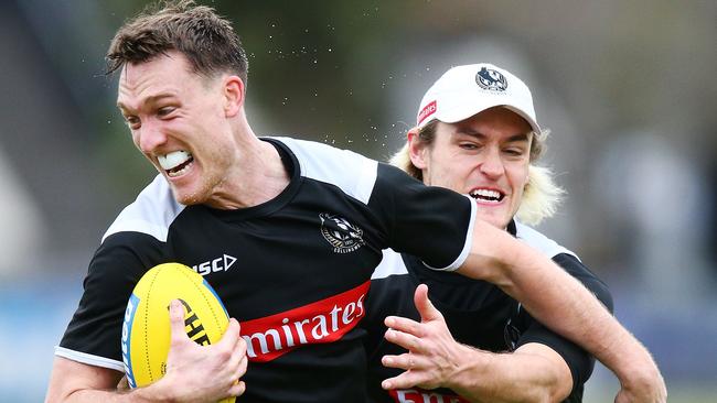 Darcy Moore tackles Jack Madgen at training. Pic: Getty Images