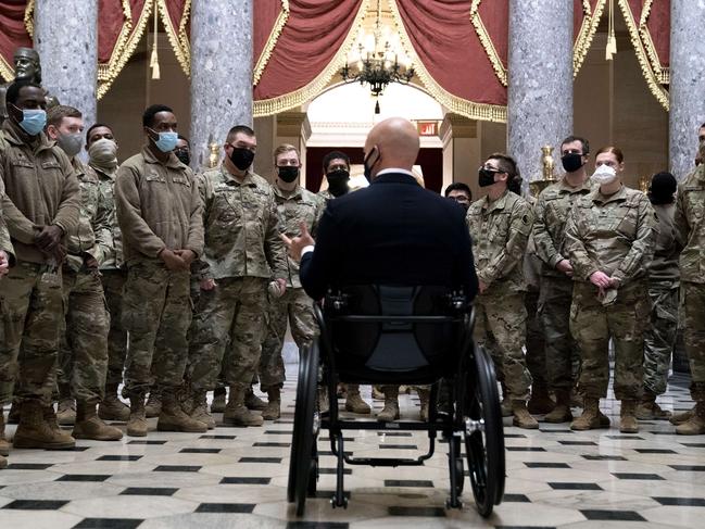 Republican Congressman Brian Mast gives members of the National Guard a tour of the US Capitol. Picture: AFP