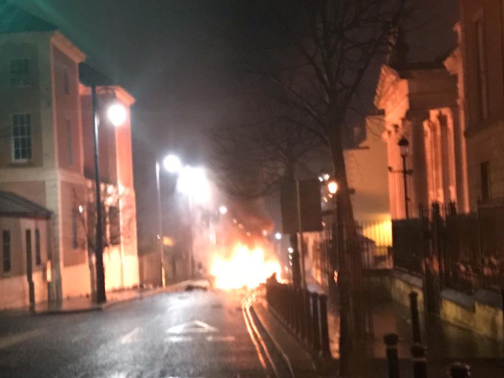 A picture released by the Police Service of Northern Ireland shows a burning car following a suspected car bomb in Londonderry. Picture: PSNI/AFP