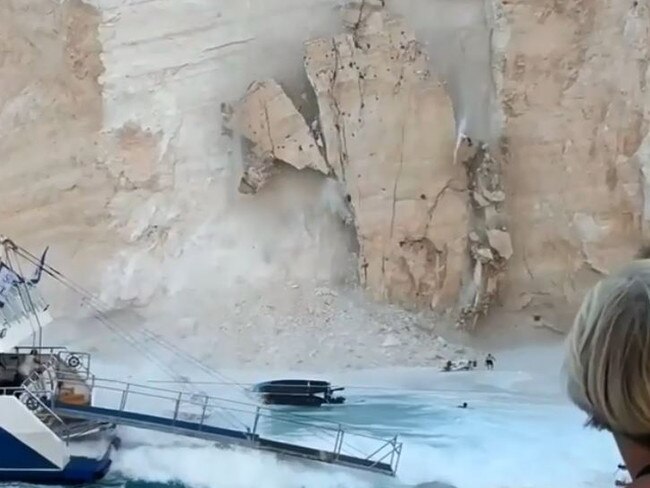 moment landslide hits greek beach