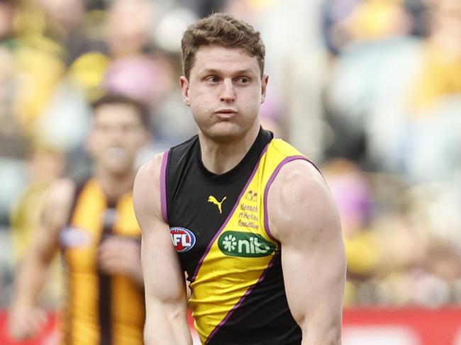 MELBOURNE, AUSTRALIA - JULY 22: Jacob Hopper of the Tigers runs with the ball during the round 19 AFL match between Richmond Tigers and Hawthorn Hawks at Melbourne Cricket Ground, on July 22, 2023, in Melbourne, Australia. (Photo by Darrian Traynor/Getty Images)