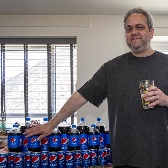 Mr Currie has lost at least 18 kgs since swapping his soft drink out for water. Picture: Matthew Lofthouse / SWNS / MEGA