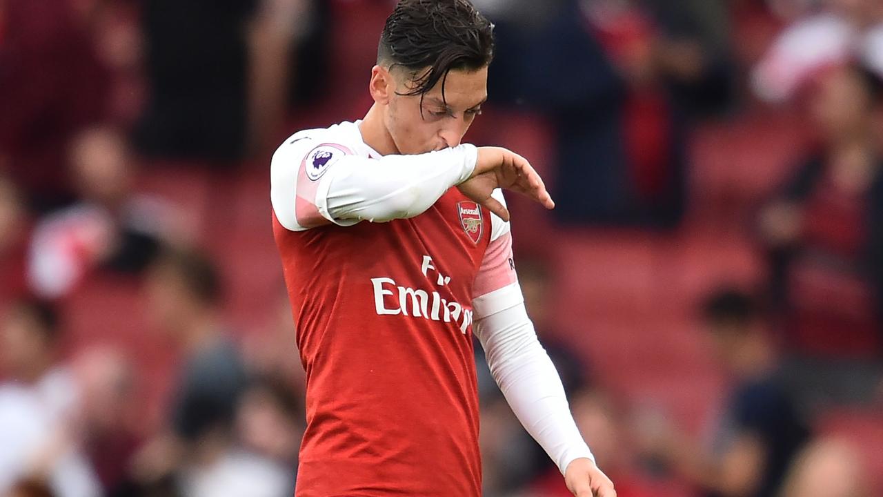 Mesut Ozil has been told to step up defensively.