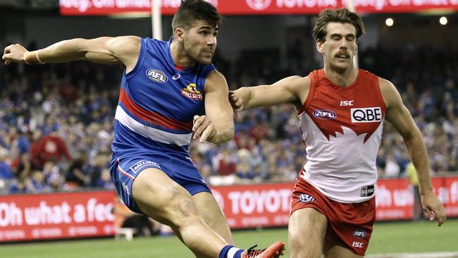 Marcus Adams puts the Dogs into attack. Picture: Wayne Ludbey